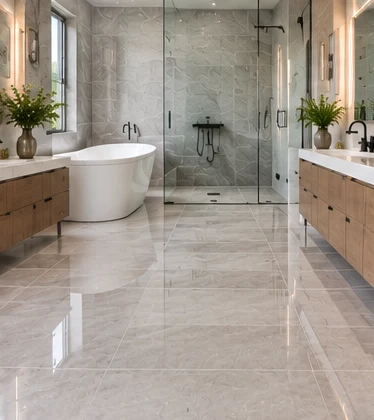 Light ceramic floor tiles in a bright bathroom
